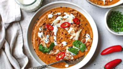 Thai coconut and lentil soup in a white bowl